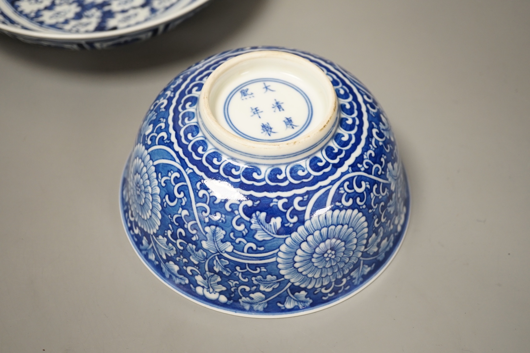 A Chinese blue and white bowl and a similar dish, 21cm